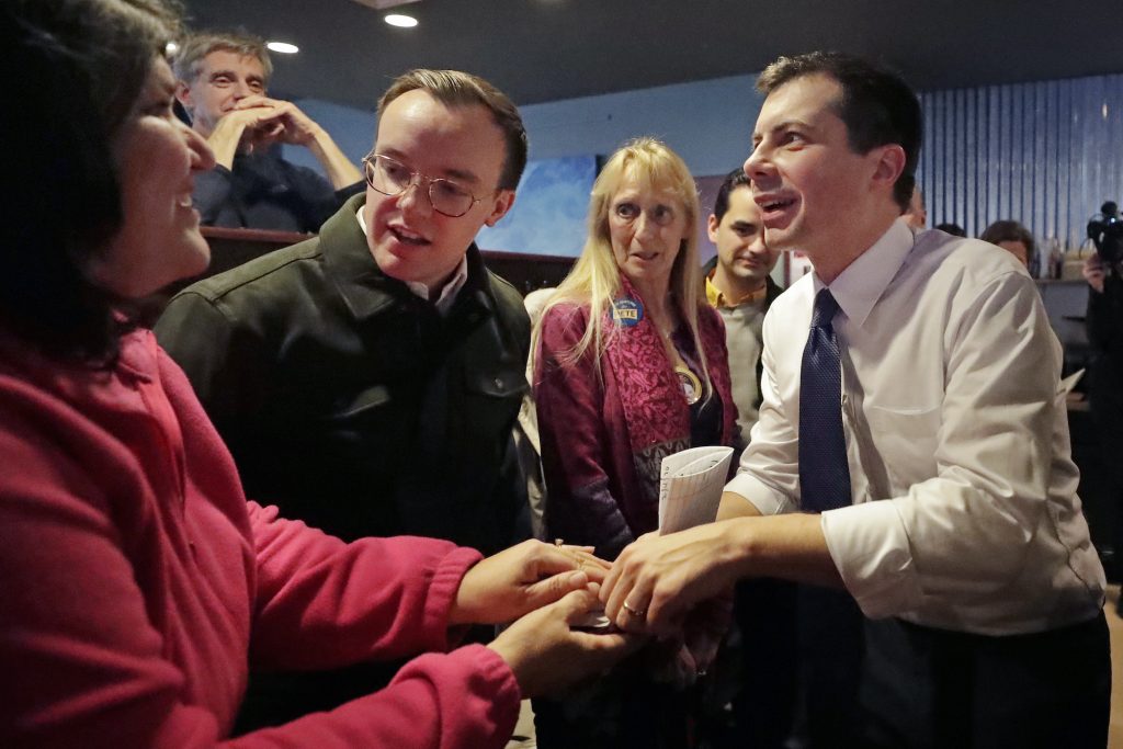 Pete Buttigieg, Chasten Buttigieg Democratic presidential candidate former South Bend Mayor Pete Buttigieg, right, and his husband, Chasten Buttigieg, left, greet people at a campaign event, Tuesday, Feb. 4, 2020, in Hampton, N.H. (Elise Amendola/AP Photo)