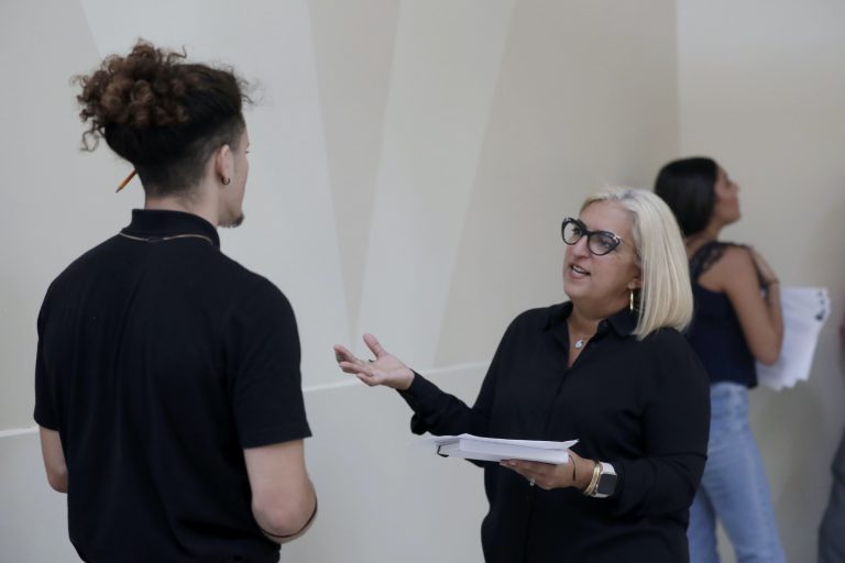 In this Oct. 1, 2019, photo, Gory Rodriguez, of Starbucks, right, interviews a job applicant during a job fair at Dolphin Mall in Miami. On Wednesday, Jan. 8, 2020 payroll processor ADP reports on how many jobs its survey estimates U.S. companies added in December. (Lynne Sladky/AP Photo)