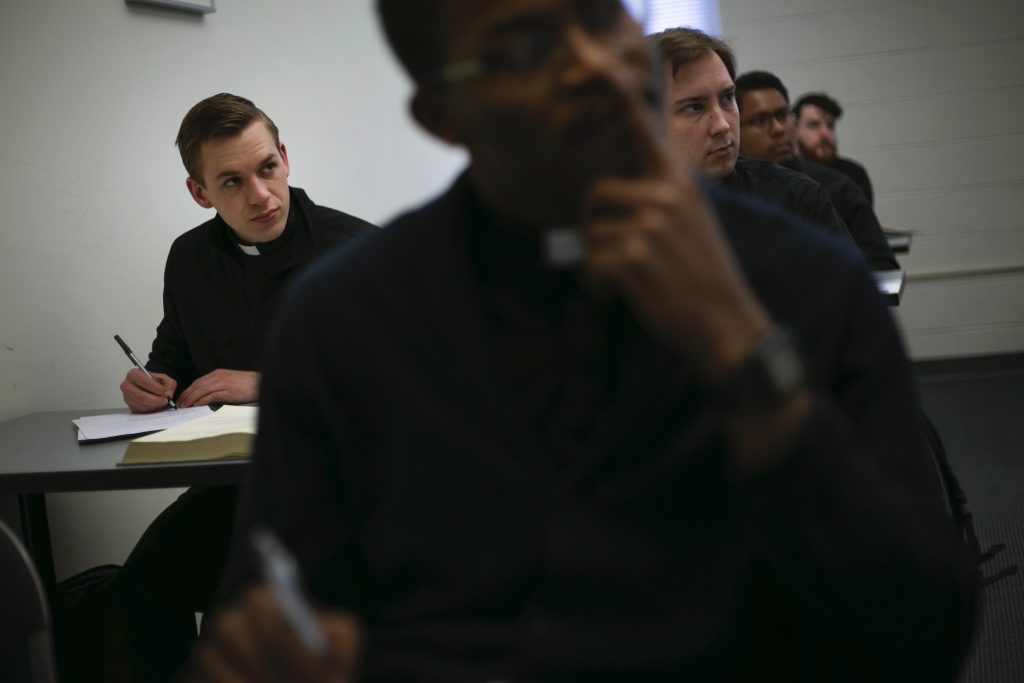 Catholic Seminaries Seminarian Daniel Rice, left, sits with classmates during a lesson on the Gospel of Luke at St. Charles Borromeo Seminary in Wynnewood, Pa. (Wong Maye-E/AP Photo)