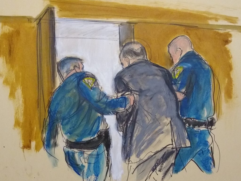 APTOPIX Sexual Misconduct Weinstein In this courtroom sketch, Harvey Weinstein, center, is led out of Manhattan Supreme Court by court officers after a jury convicted him of rape and sexual assault, Monday, Feb. 24, 2020 in New York. The jury found him not guilty of the most serious charge, predatory sexual assault, which could have resulted in a life sentence in New York. (Elizabeth Williams via AP)