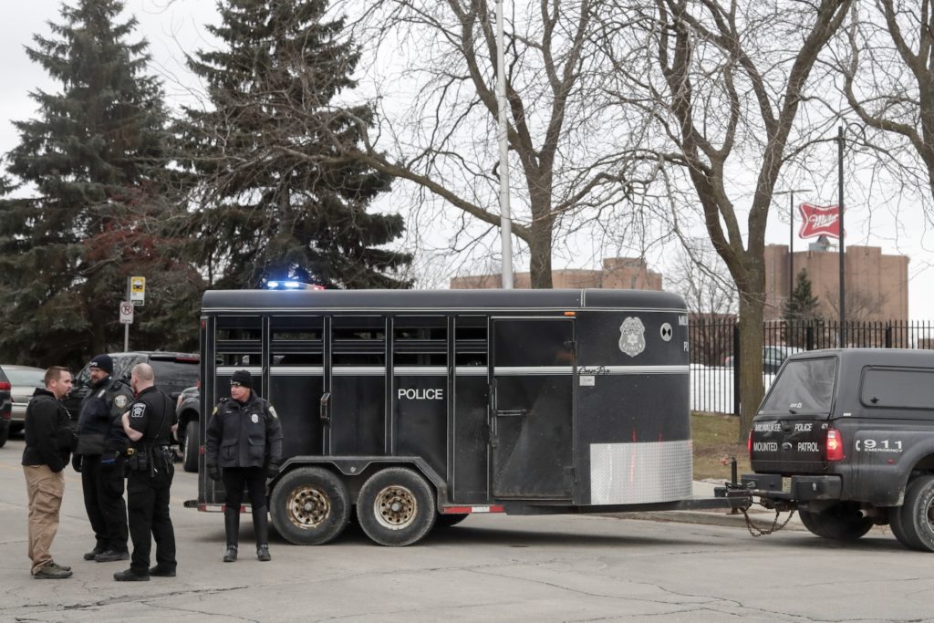 Police work outside the Molson Coors Brewing Co. campus in Milwaukee on Wednesday, Feb. 26, 2020, after reports of a possible shooting. (Morry Gash/AP Photo)