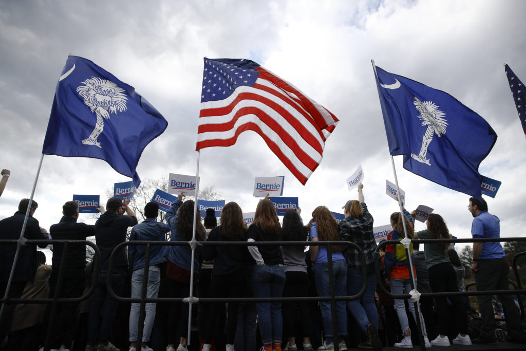 Bernie Sanders Attendees listen to Democratic presidential candidate Sen. Bernie Sanders, I-Vt., speak during a campaign event, Friday, Feb. 28, 2020, in Columbia, S.C. (AP Photo/Matt Rourke)