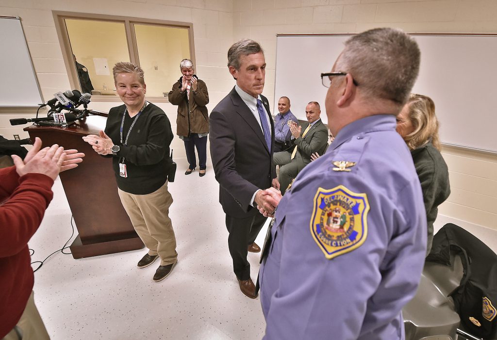 GovCarneyVisitsPrisonEducationBuilding3 Delaware Governor John Carney shakes hands with Delaware Department of Corrections Warden Dana G. Metzger after a tour of the expanded maximum security education building at the James T. Vaughn Correctional Facility in Smyrna, Delaware on Wednesday, Feb. 5, 2020. (Butch Comegys for WHYY)
