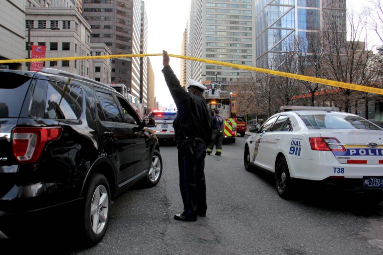 Police shut down JFK Boulevard at 17th Street after a report of an active shooter in the Sterling apartments. (Emma Lee/WHYY)