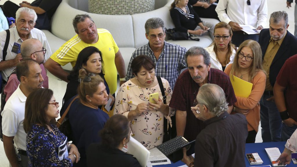 People inquire about temporary positions available for the 2020 census during a job fair in Miami in September 2019. People inquire about temporary positions available for the 2020 census during a job fair in Miami in September 2019.
(Lynne Sladky/AP Photo)