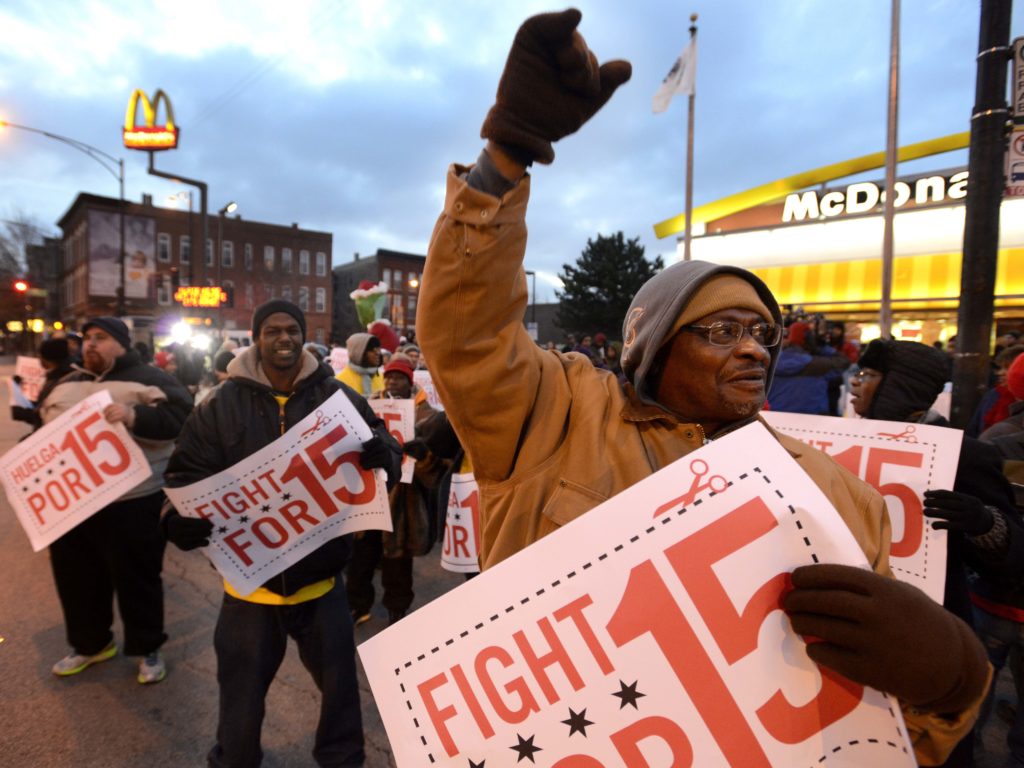 Demonstrators rally for better wages outside a McDonald’s restaurant in Chicago in December 2013. Demonstrators rally for better wages outside a McDonald's restaurant in Chicago in December 2013. (Paul Beaty/AP Photo)