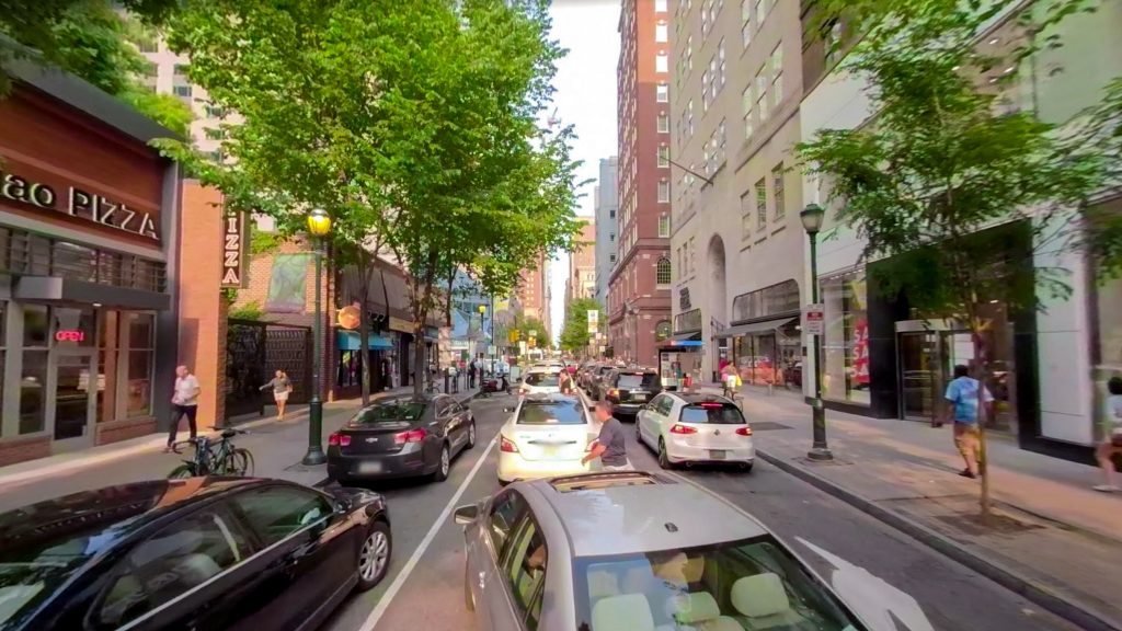 chestnutstreet-markhenninger-traffic Pedestrians weaving in and out of traffic is a common sight on Chestnut Street in Center City. (Mark Henninger/Imagic Digital)