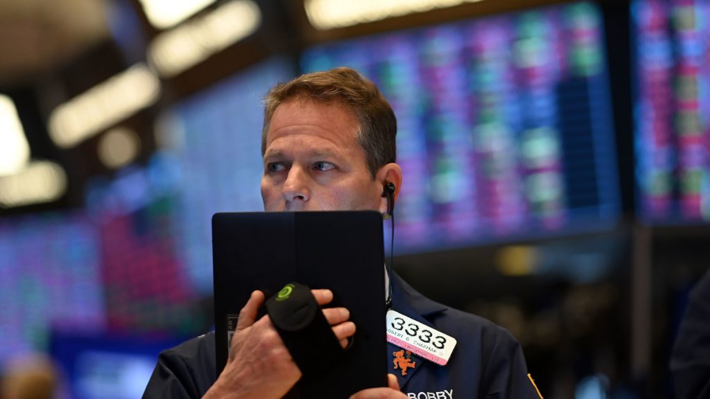 Traders work during the opening bell at the New York Stock Exchange on Thursday. Wall Street stocks opened sharply lower amid fears the coronavirus will grow into a significant international health crisis. Traders work during the opening bell at the New York Stock Exchange on Thursday. Wall Street stocks opened sharply lower amid fears the coronavirus will grow into a significant international health crisis. (Johannes Eisele/AFP via Getty Images)