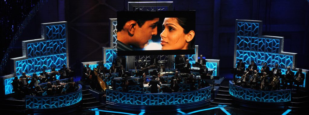 Musicians perform a song from Slumdog Millionaire during the 81st Annual Academy Awards on Feb. 22, 2009, in Hollywood, Calif. The film won 8 Oscars including Best Picture that year — and had box office returns to show for it. (Gabriel Bouys/AFP via Getty Images)