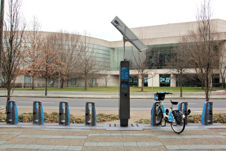 A nearly empty Indego docking station on 6th Street