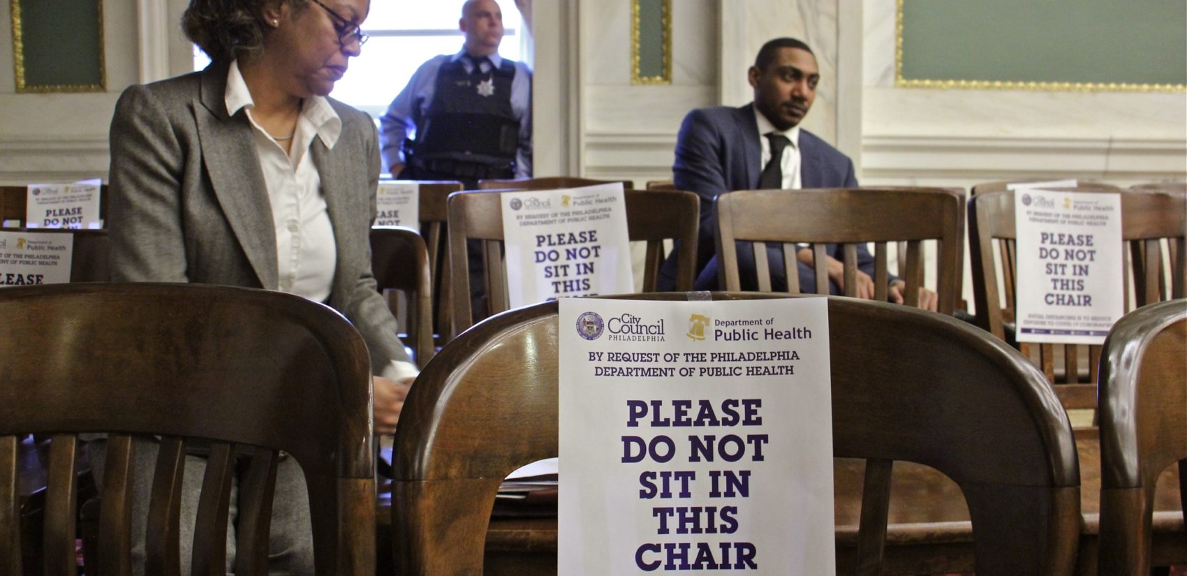 At a March 12 Philadelphia City Council meeting, attendees were told to use every other chair to reduce the chances of exposure to coronavirus. (Emma Lee/WHYY)