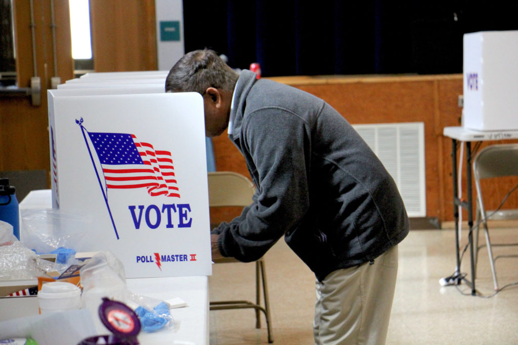 2020 03 17-e lee-bensalem-state house special election-2 A voter fills out a ballot at Cecelia Snyder Middle School in Bensalem during a special election to choose a new member of the Pennsylvania House of Representatives in March 2020. (Emma Lee/WHYY)
