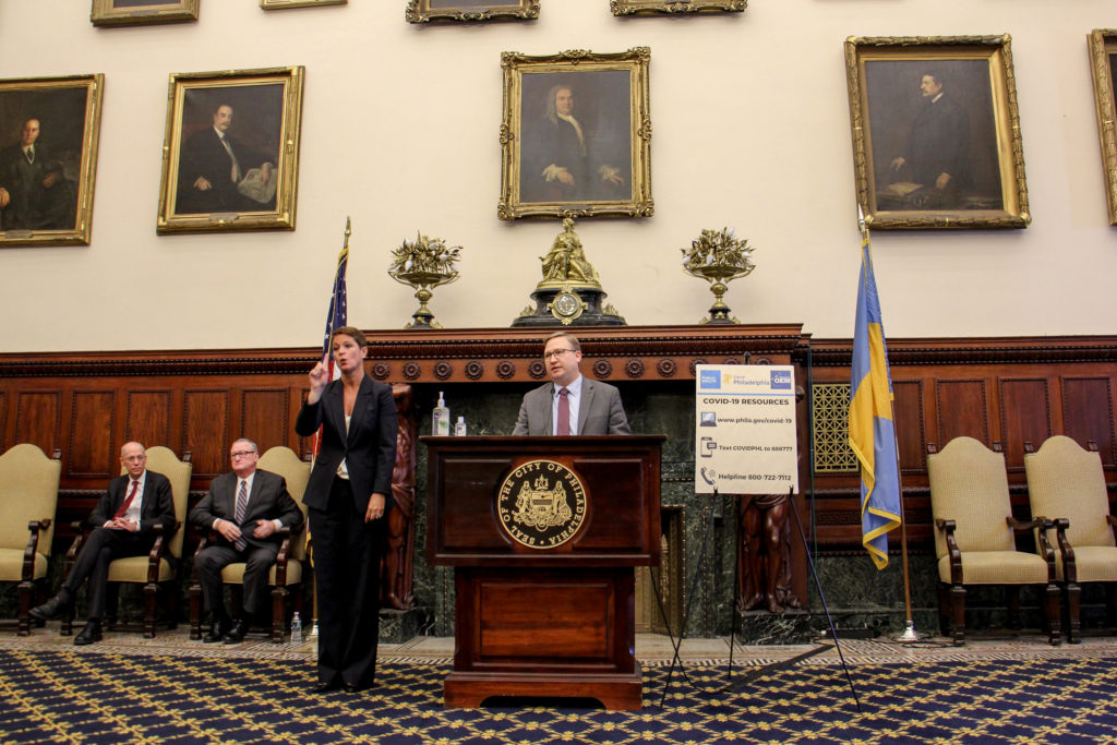 2020 03 18-e lee-thomas farley jim kenney brian abernathy-philadelphia city hall-coronavirus update Philadelphia Managing Director Brian Abernathy speaks during the daily coronavirus update at City Hall, joined by (from left) Health Commissioner Thomas Farley and Mayor Jim Kenney. (Emma Lee/WHYY)