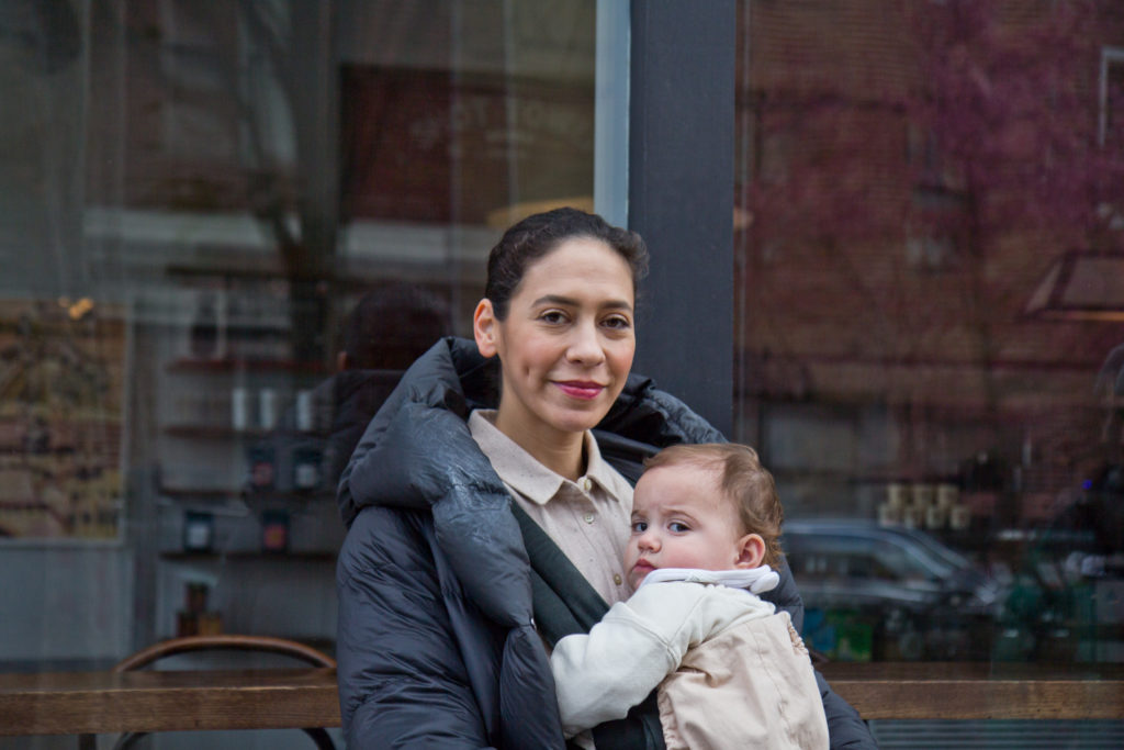 2020 3 16 k paynter shot tower Mariel Freeman, the owner of Shot Tower coffee house, and her 9th month-old baby Gigi. (Kimberly Paynter/WHYY)