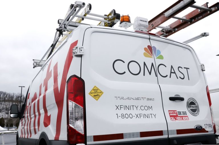 A Comcast van is pictured on a Philly street