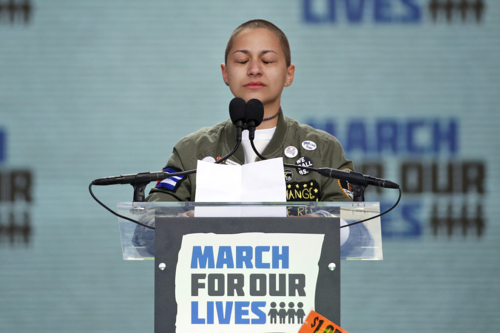 Emma Gonzalez FILE - In this March 24, 2018 file photo, Emma Gonzalez, a survivor of the mass shooting at Marjory Stoneman Douglas High School in Parkland, Fla., closes her eyes and cries as she stands silently at the podium for the amount of time it took the Parkland shooter to go on his killing spree during the