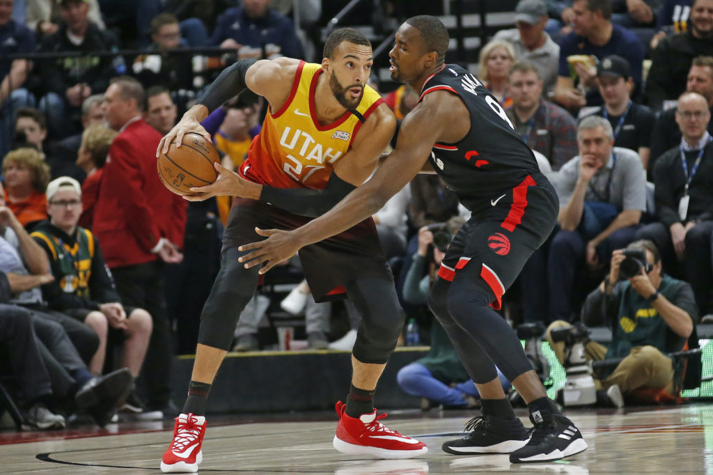Serge Ibaka, Rudy Gobert Toronto Raptors center Serge Ibaka (9) guards against Utah Jazz center Rudy Gobert (27) in the first half during an NBA basketball game Monday, March 9, 2020, in Salt Lake City. (Rick Bowmer/AP Photo)