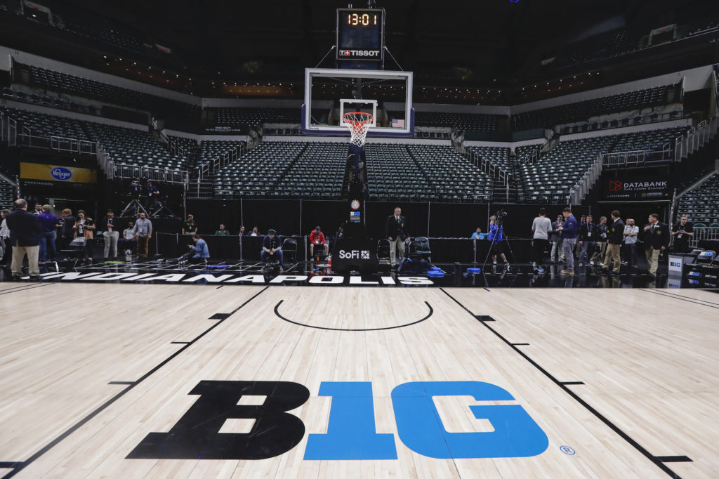 APTOPIX Sports-Virus Outbreak Basketball The seating area and court at Bankers Life Fieldhouse is shown in Indianapolis, Thursday, March 12, 2020, after the Big Ten Conference announced the remainder of the men’s tournament is cancelled, effective immediately. (AP Photo/Michael Conroy)