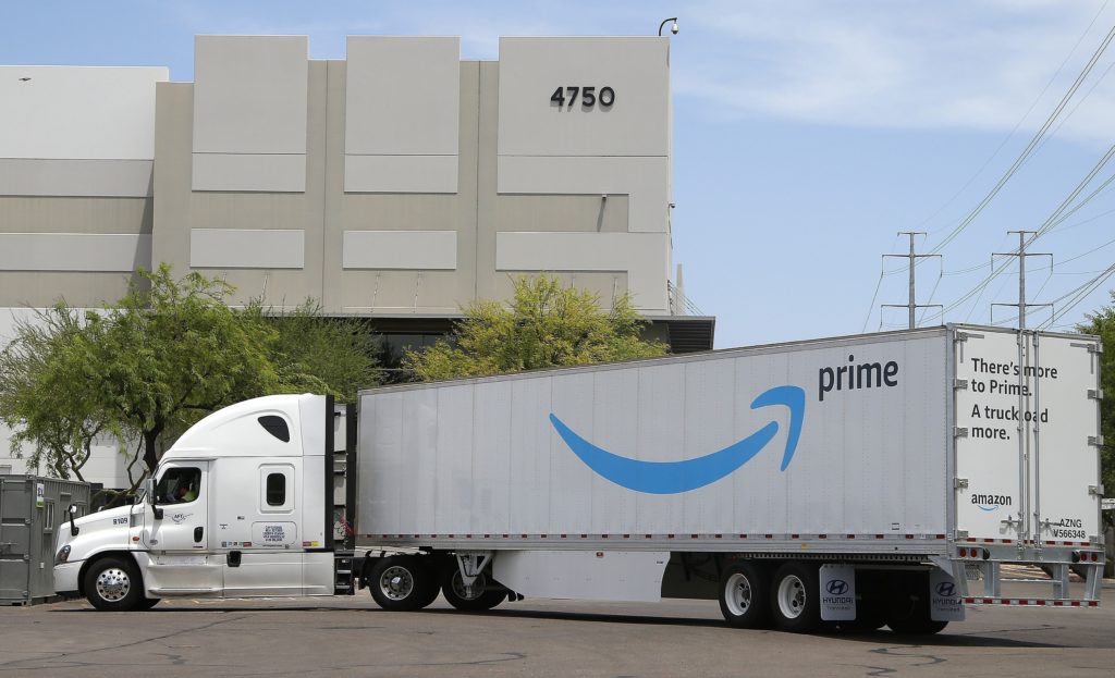 Virus-Outbreak Amazon This July 17, 2019, file photo shows an Amazon shipping truck at a fulfillment center in Phoenix. (Ross D. Franklin/AP Photo)