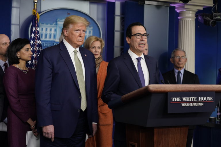 Treasury Secretary Steven Mnuchin speaks during a press briefing with the coronavirus task force, at the White House, Tuesday, March 17, 2020, in Washington, as President Donald Trump looks on. (Evan Vucci/AP Photo)