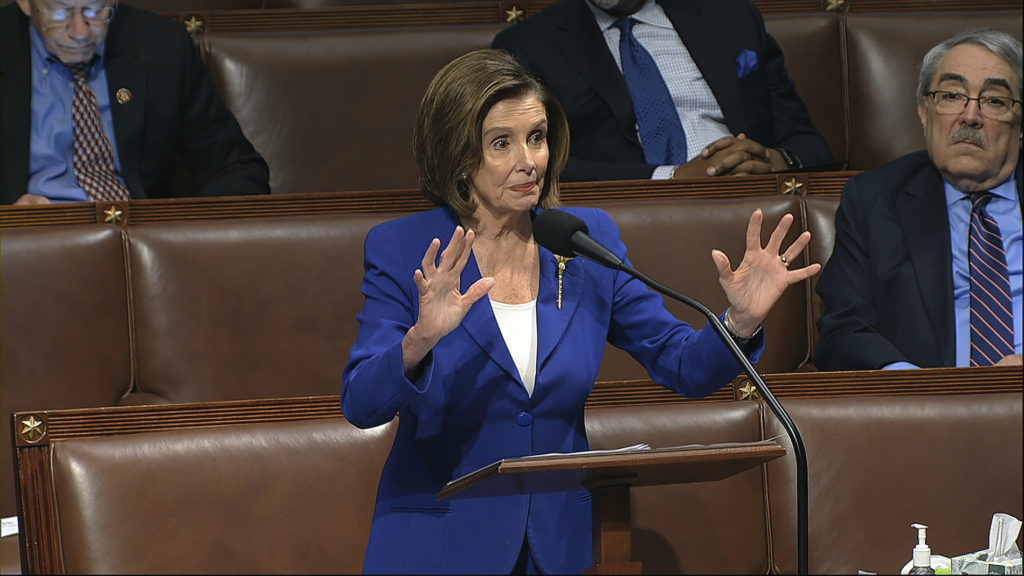 Virus Outbreak Congress In this image from video, House Speaker Nancy Pelosi of Calif., speaks on the floor of the House of Representatives at the U.S. Capitol in Washington, Friday, March 27, 2020. (House Television via AP)
