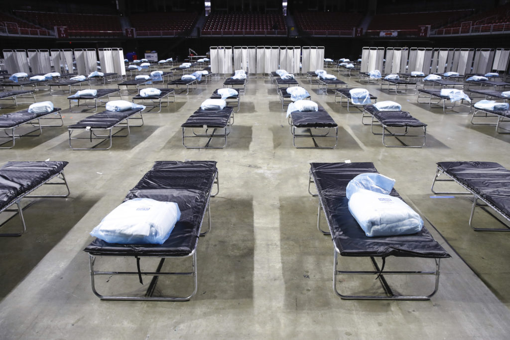 Virus Outbreak Pennsylvania A federal medical station is set up at Temple University's Liacouras Center in Philadelphia, Monday, March 30, 2020, to accommodate an influx in hospital patients due to the coronavirus outbreak. (AP Photo/Matt Rourke)