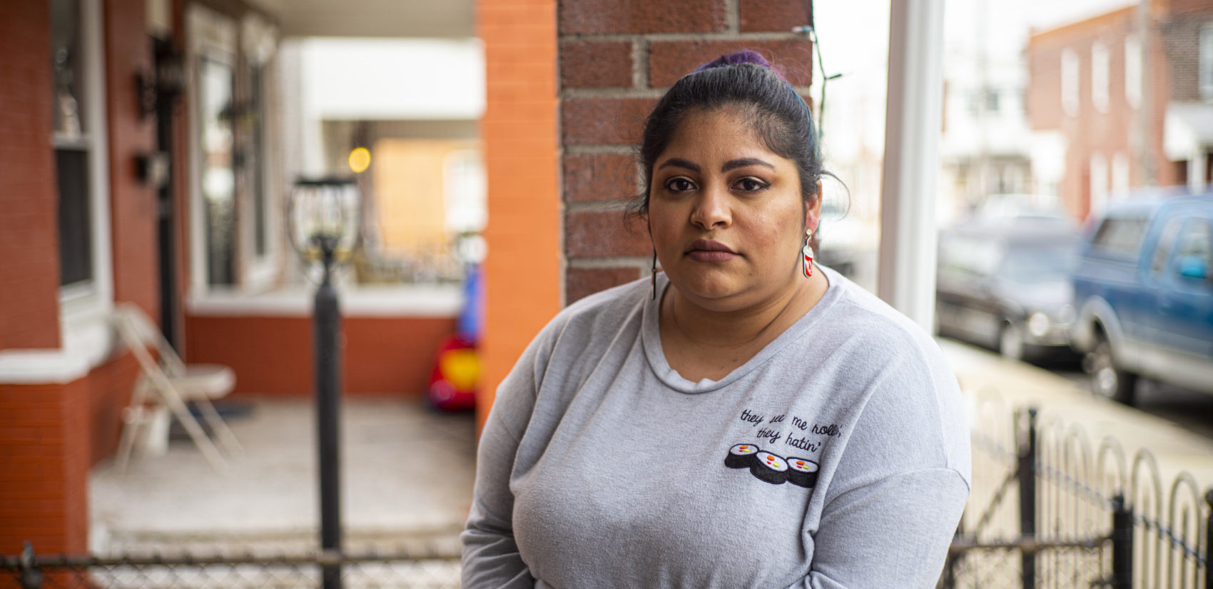Yali Perez and her family became homeowners in Bridesburg to escape crime in other parts of the city. As Puerto Rican residents, she says things go well in the 'Burg as long as they keep to themselves. (Jessica Kourkounis for Keystone Crossroads)
