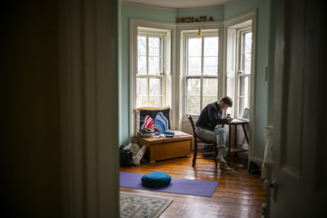 Michaela Prell, Riley's sister, is a senior at Sarah Lawrence College. She set up a make-shift desk in her old bedroom since school shut down. (Jessica Kourkounis for Keystone Crossroads)
