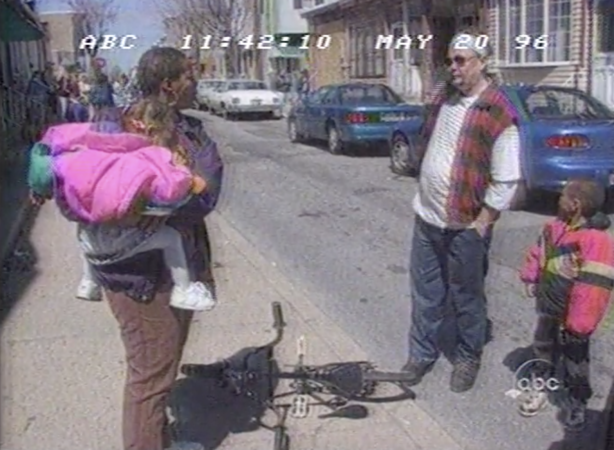 Bridesburg residents talking in the street amid a media circus during Nightline's 1996 feature. (Vanderbuilt Television News Archive)