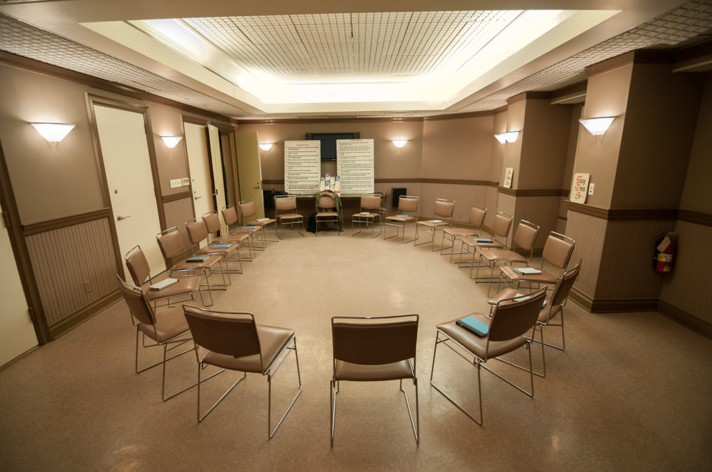 12 Step Recovery Meeting Room With Chairs 12 step recovery meeting room with chairs and signs. (Bigstock/blueskies9)