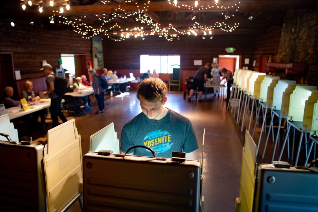 Voters fill out their ballots for the presidential primary in a log cabin run by the American Legion in San Anselmo, Calif., on Super Tuesday, March 3, 2020. While no significant foreign interference was detected, election and law enforcement officials are closely monitoring this year’s primaries. Voters fill out their ballots for the presidential primary in a log cabin run by the American Legion in San Anselmo, Calif., on Super Tuesday, March 3, 2020. While no significant foreign interference was detected, election and law enforcement officials are closely monitoring this year's primaries. (John Edelson/AFP via Getty Images)