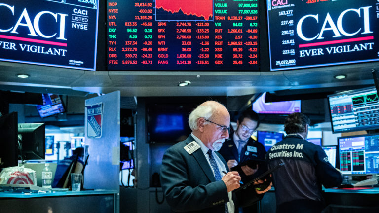After weeks of turmoil over the economic toll of the coronavirus, U.S. stock indexes entered a bear market, signaling an end to their 11-year winning streak. (Jeenah Moon/Getty Images)