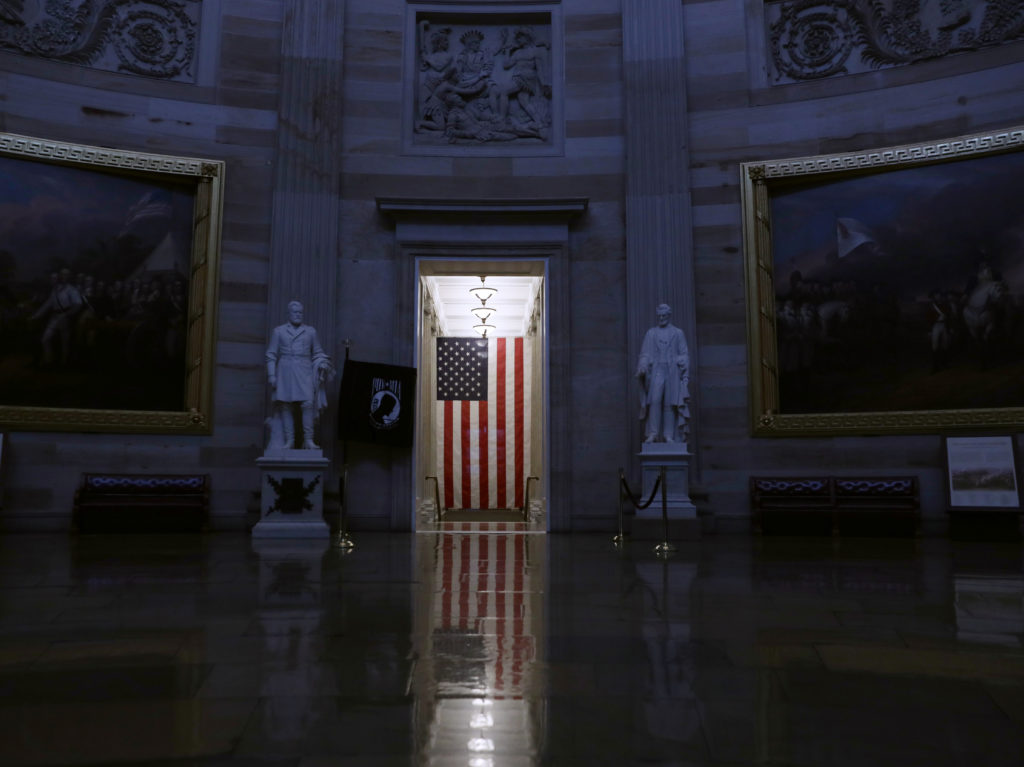 The White House Office of Management and Budget issued new guidance Saturday telling federal workers that “only mission-critical travel is recommended at this time.” Above, the rotunda at the U.S. Capitol stands empty after the visitor center suspended all public tours amid the coronavirus outbreak. The White House Office of Management and Budget issued new guidance Saturday telling federal workers that
