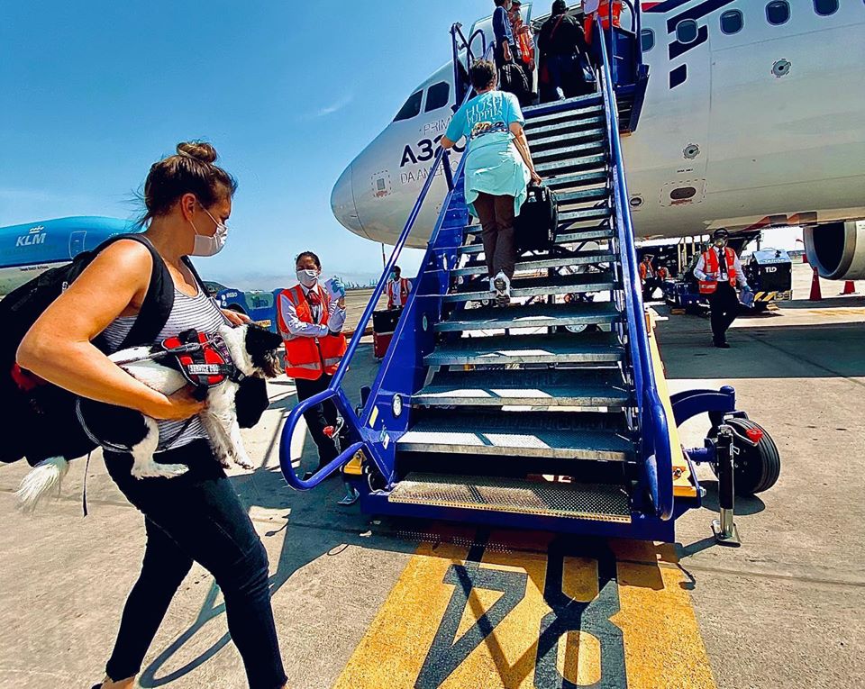 h Sara Schuenemann boards last U.S.-bound charter flight out of Peru after being stranded in Lima for 12 days. (Photo courtesy of Richard Levering)