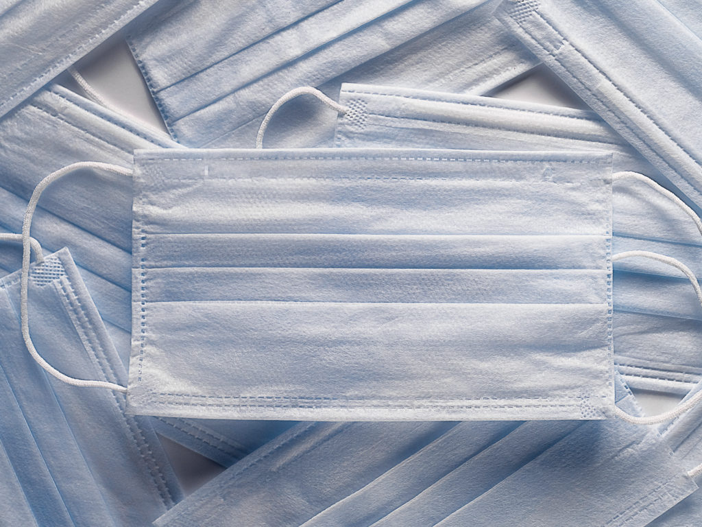 Pharmacists typically wear surgical masks when preparing certain medicines — to keep the drugs sterile. But these masks, as well as of N95 respirators, are more often now going to front-line workers caring for COVID-19 patients. Pharmacists typically wear surgical masks when preparing certain medicines — to keep the drugs sterile. But these masks, as well as of N95 respirators, are more often now going to front-line workers caring for COVID-19 patients. (Aleksandr Zubkov/Getty Images)
