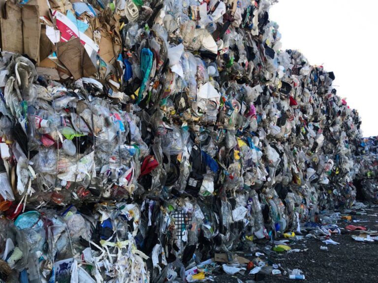 A wall of plastic trash at Garten Services in Salem, Ore., is headed to the landfill. The vast majority of plastic can't be or won't be recycled. (Laura Sullivan / NPR)