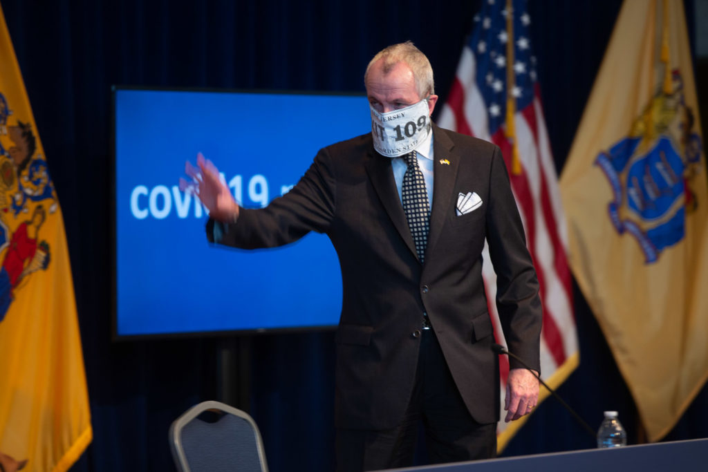 2020 04 08-pool m mancuso-phil murphy-trenton war memorial-governors coronavirus briefing-4 New Jersey Governor Phil Murphy wearing a mask that says 'EXIT 109' for his daily coronavirus briefing on Wednesday, April 8, 2020. (Pool photo by Michael Mancuso | NJ Advance Media for NJ.com)