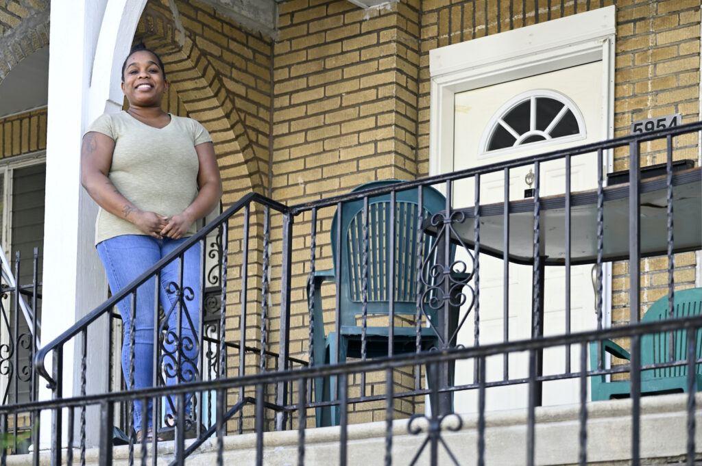 US_COVID_PHILADELPHIA Evelyn Coates stands on the porch of her home in West Oak Lane on Tuesday, April 14, 2020. (Bastiaan Slabbers for WHYY)
