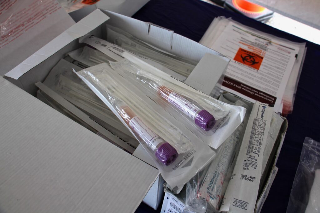 2020 04 29-e lee-camden nj-covid testing site In this 2020 photo, COVID-19 test kits are laid out on a table at the testing site at 2600 Mt. Ephraim Ave., Camden, New Jersey. (Emma Lee/WHYY)