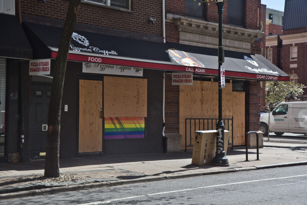 2020 3 24 k paynter boarded businesses center city-4 A pizza shop on 12th Street in Center City Philadelphia are boarded up during non-essential business shutdown orders aimed to slow the spread of COVID-19. (Kimberly Paynter/WHYY)
