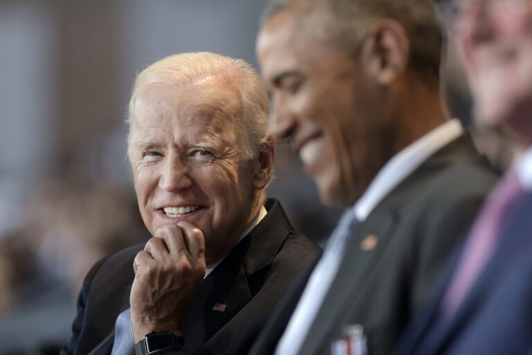 Vice President Joe Biden, left, watches President Barack Obama, center, sitting with Defense Secretary Ash Carter, right, as they listen to Joint Chiefs Chairman Gen. Joseph Dunford talk about Obama during an Armed Forces Full Honor Farewell Review, Wednesday, Jan. 4, 2017, at Conmy Hall, Joint Base Myer-Henderson Hall, Va. (Susan Walsh/AP Photo)