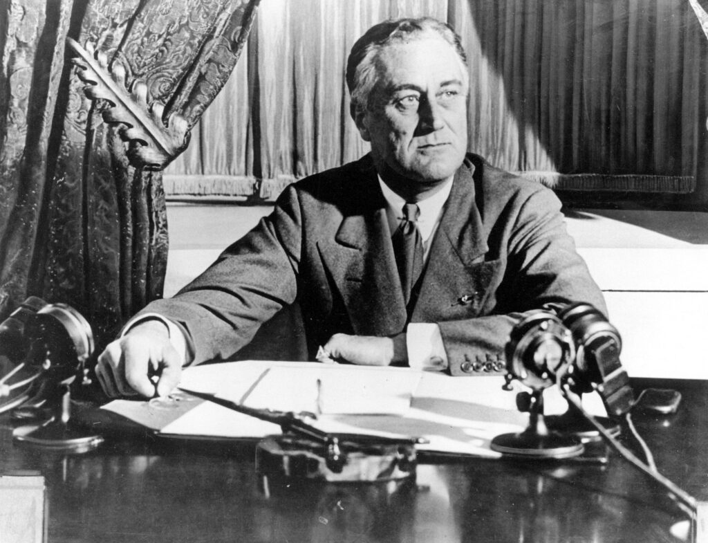 FRANKLIN D. ROOSEVELT In this March 1933, file photo, President Franklin D. Roosevelt delivers his first radio