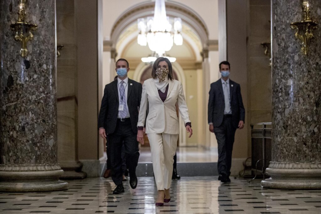 Nancy Pelosi In this April 23, 2020 photo House Speaker Nancy Pelosi of Calif., walks to her office after signing the Paycheck Protection Program and Health Care Enhancement Act, H.R. 266, after it passed the House on Capitol Hill in Washington. (Andrew Harnik/AP Photo)