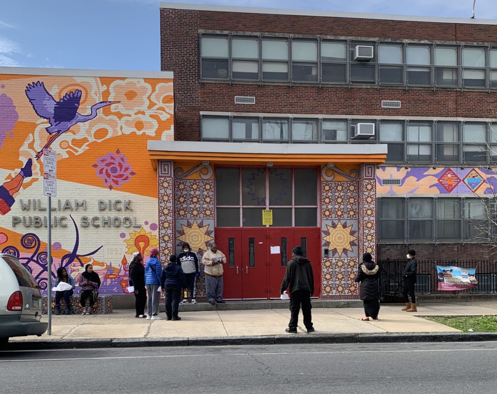 Dick Elementary School chromebooks People outside William Dick Elementary School in North Philadelphia wait to pick up Chromebooks.