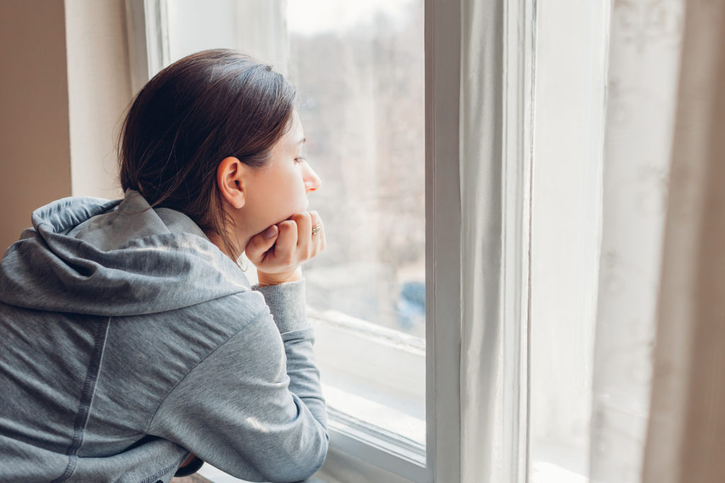 Isolation At Home During Coronavirus Covid-19 Pandemic. Woman Lo (Mariia Boiko/BigStock)