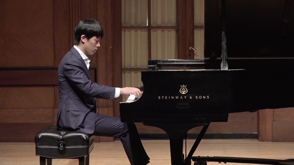 Pianist Junhui Chen performs on stage at Curtis