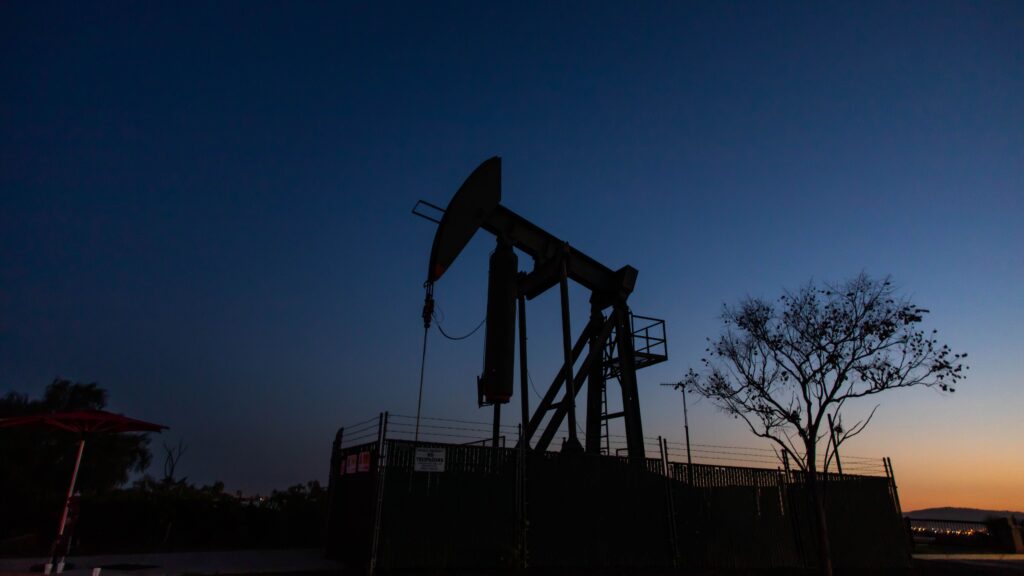 Producers have kept pumping oil, even if they’re not making money, partly because wells — once shut down — can be difficult to get back up and running. Here, a pump jack operates at Willow Springs Park in Long Beach, Calif. Producers have kept pumping oil, even if they're not making money, partly because wells — once shut down — can be difficult to get back up and running. Here, a pump jack operates at Willow Springs Park in Long Beach, Calif. (Apu Gomes/AFP via Getty Images)