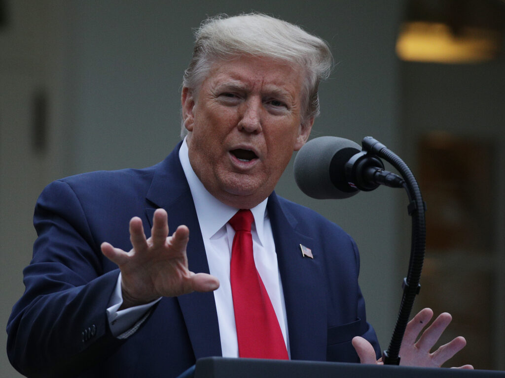 President Trump addresses reporters in the White House Rose Garden during the daily coronavirus task force briefing on April 14. (Alex Wong/Getty Images)
