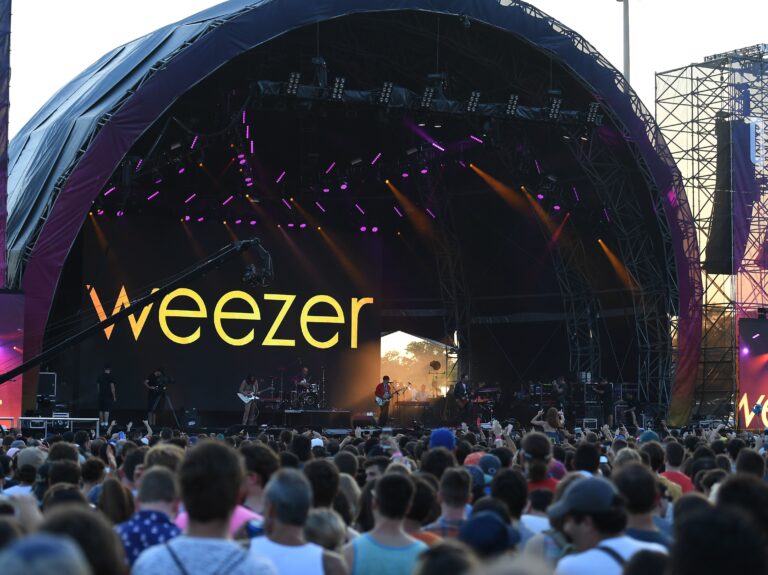 The U.S. leg of Weezer's Hella Mega tour with Green Day and Fall Out Boy has yet to be canceled due to the coronavirus, leaving fans who purchased tickets in limbo when it comes to refunds. (Angela Weiss/AFP via Getty Images)