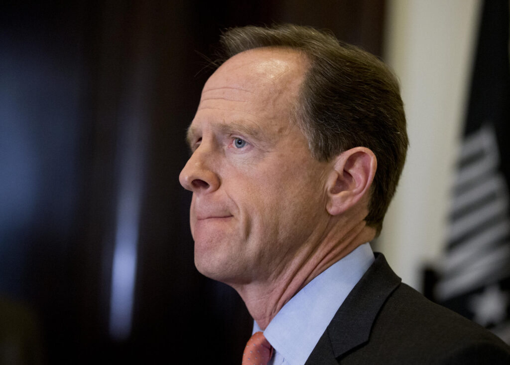 Sen. Patrick J. Toomey, R-Pa. speaks to reporters outside his office on Capitol Hill, in Washington, Tuesday, April 12, 2016. (Manuel Balce Ceneta/AP Photo, file)